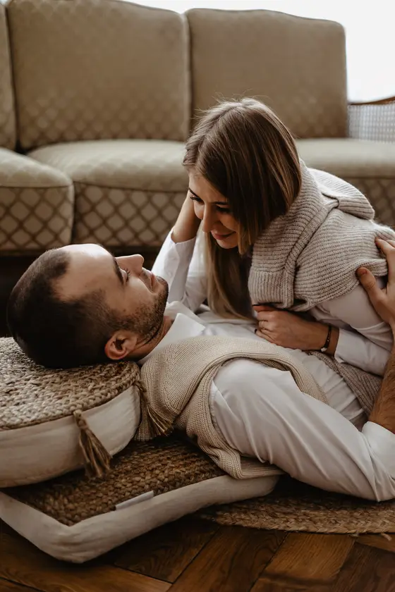 Intimate couple moment on floor preparing for home photo session preparation Tenerife