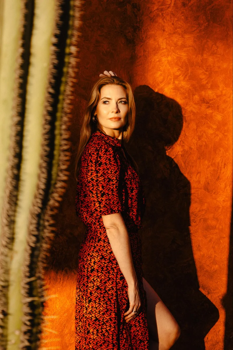 Elegant women's portrait in a red dress during a Tenerife session