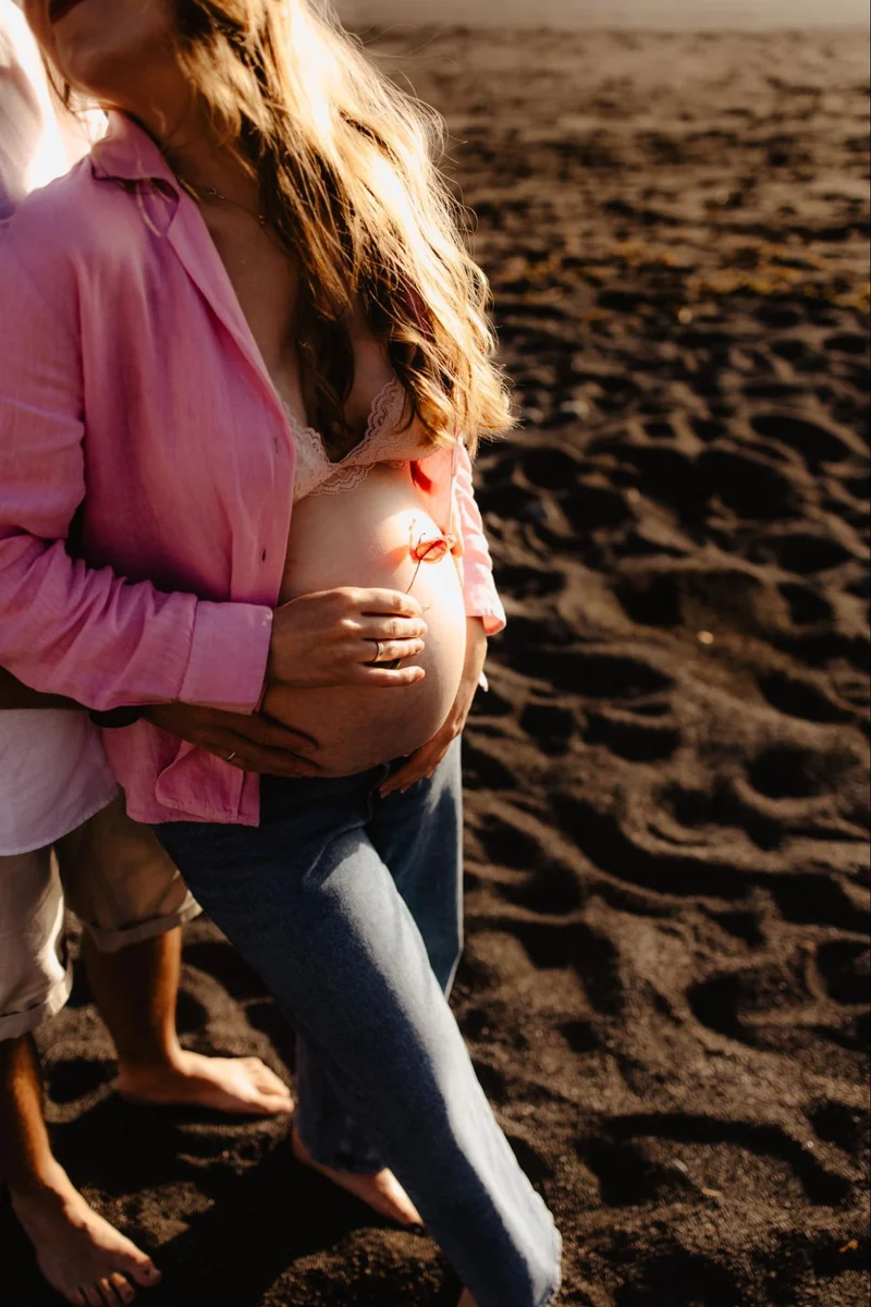 Natural maternity portrait on a Tenerife beach