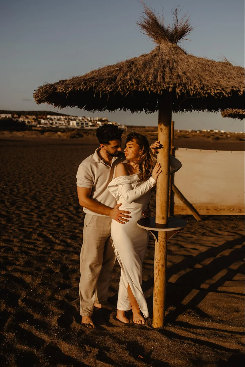 Couple embracing by the beach during a romantic Tenerife session