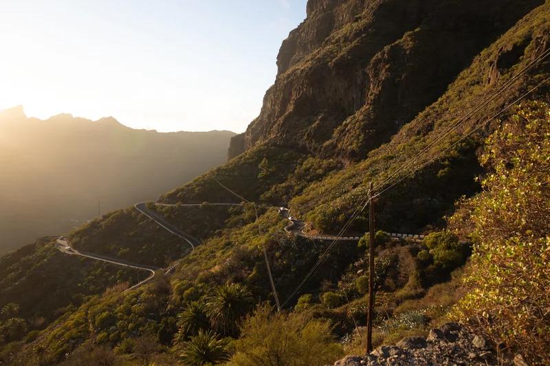 Masca wedding photography serpentine mountain road through volcanic ravine with golden sunlight