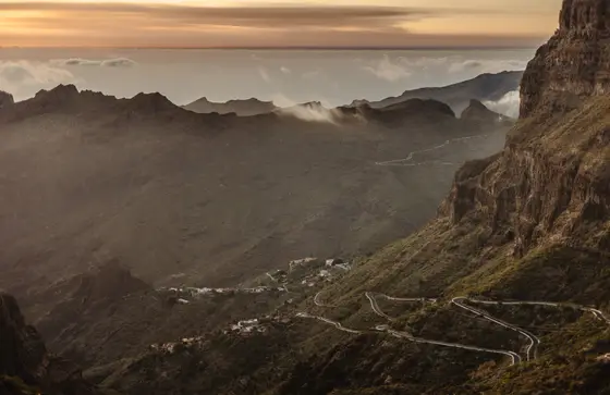 Masca wedding photography dramatic mountain landscape with mist and volcanic rock formations at sunset