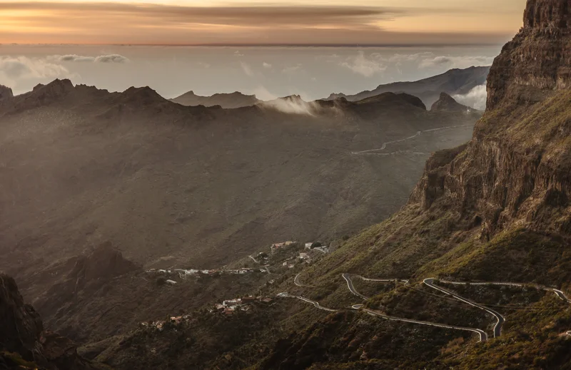 Masca wedding photography dramatic mountain landscape with mist and volcanic rock formations at sunset