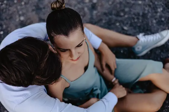 Romantic Spanish couple during intimate session on Tenerife's volcanic black beach