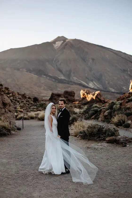 Newlywed couple Tenerife wedding session Mount Teide background veil elegance dramatic landscape